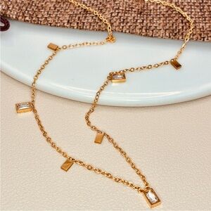 Anthropologie Elegant Gold Necklace with Crystal Accents